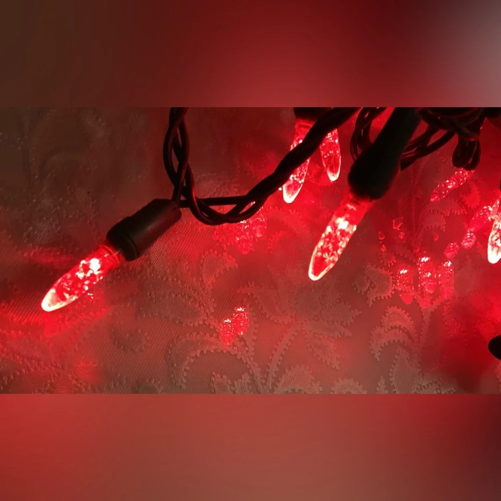 2 Christmas string lights. Red Skinny faceted bulbs 1”